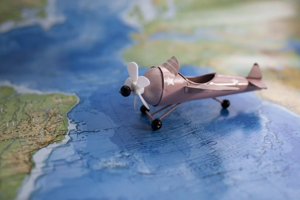 decorative retro airplane on the map. travel concept.